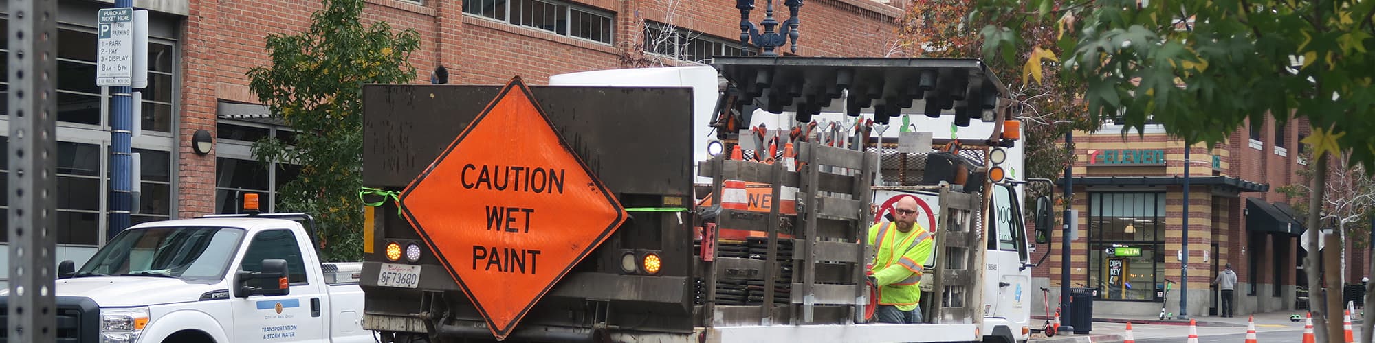 Caution Wet paint sign during city repairs